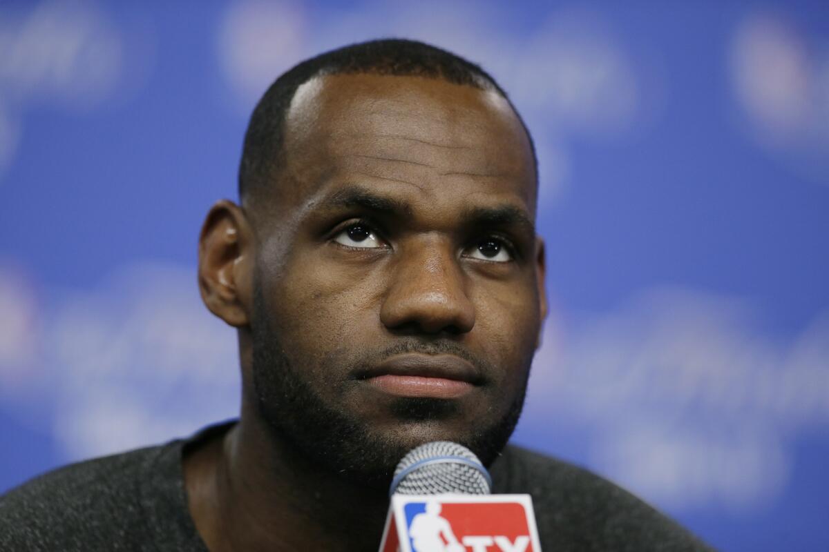 LeBron James is unhappy with talk that the Heat lucked into the title last season. Above, James at a news conference Wednesday in San Antonio.