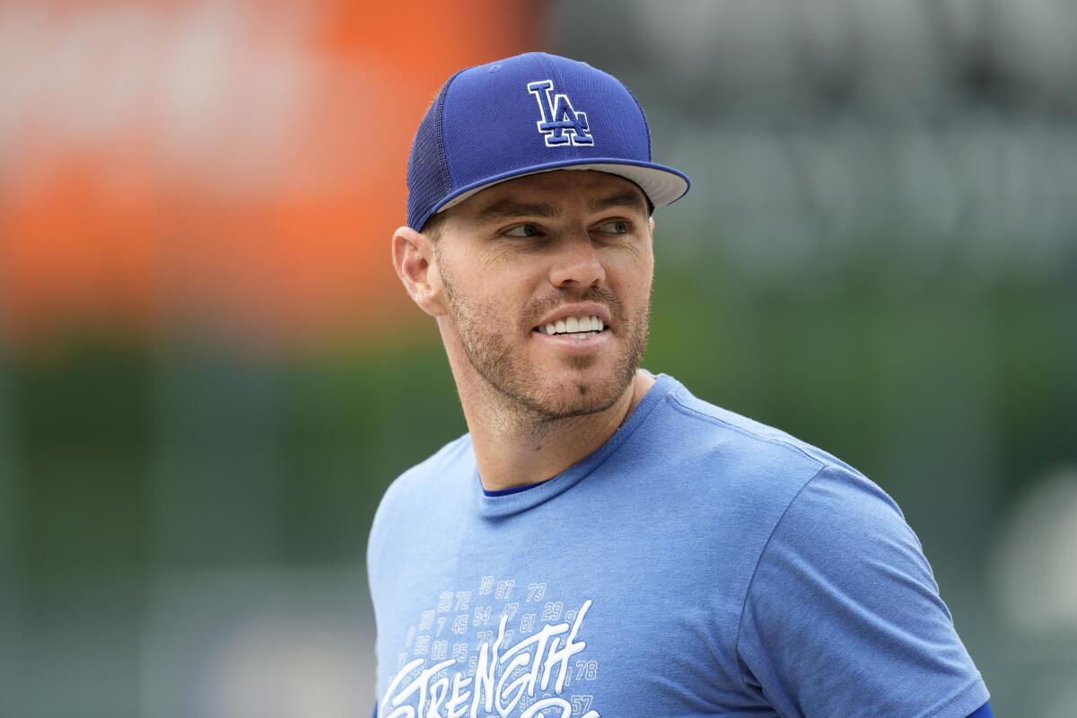 Dodgers first baseman Freddie Freeman warms up before a win over the Colorado Rockies.