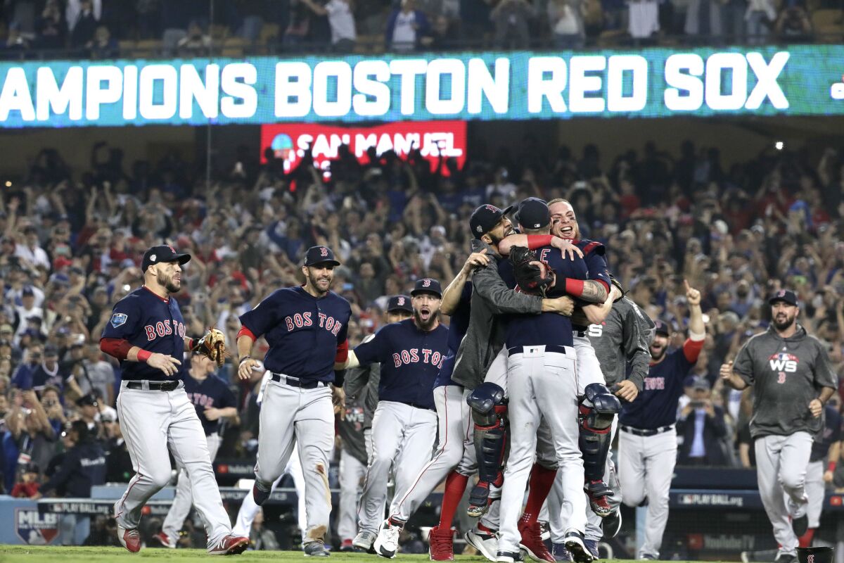 The Boston Red Sox celebrate winning the World Series at Dodger Stadium on Oct. 28, 2018.