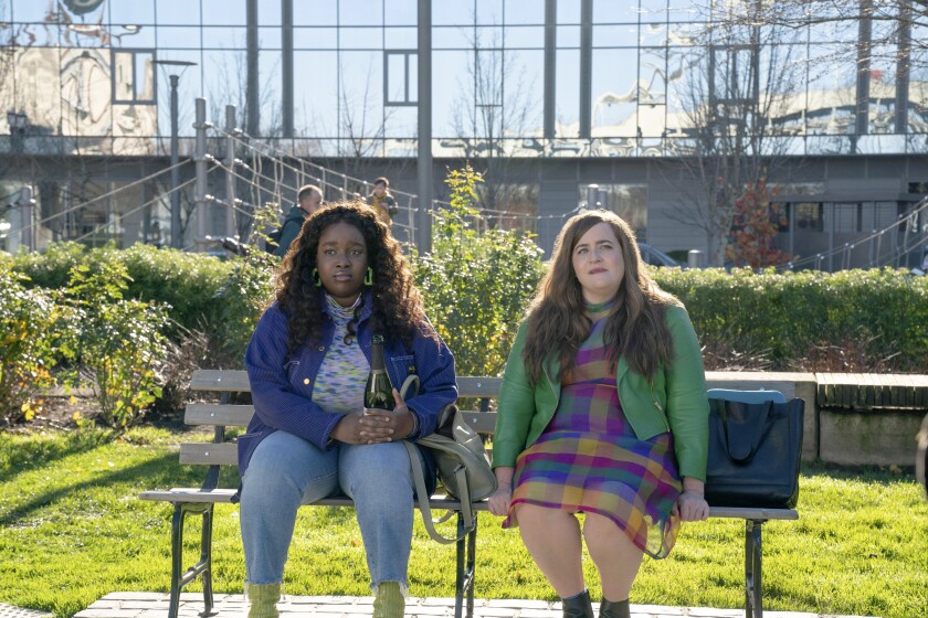 This image released by Hulu shows Lolly Adefope, left, and Aidy Bryant in a scene from the Portland-set comedy series "Shrill." (Hulu via AP)