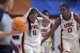 Southern California's Destiny Littleton (11) and Rayah Marshall (13) react to a missed scoring opportunity.