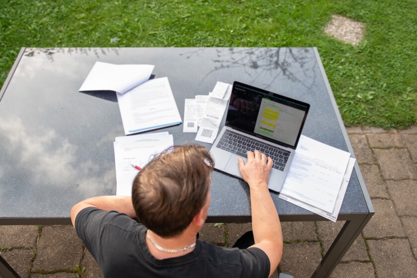 ILLUSTRATION - 13 September 2021, Baden-Wuerttemberg, Fischbach: A man sits at home in the garden and works on his laptop. Photo: Silas Stein/dpa (Photo by Silas Stein/picture alliance via Getty Images)