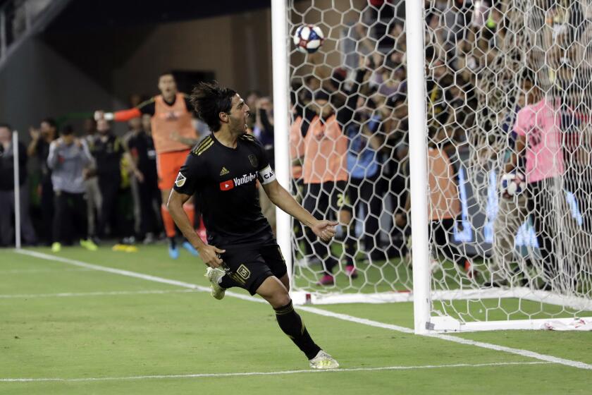 Los Angeles FC's Carlos Vela celebrates after scoring against the Los Angeles Galaxy during the second half of an MLS soccer match Sunday, Aug. 25, 2019, in Los Angeles. (AP Photo/Marcio Jose Sanchez)