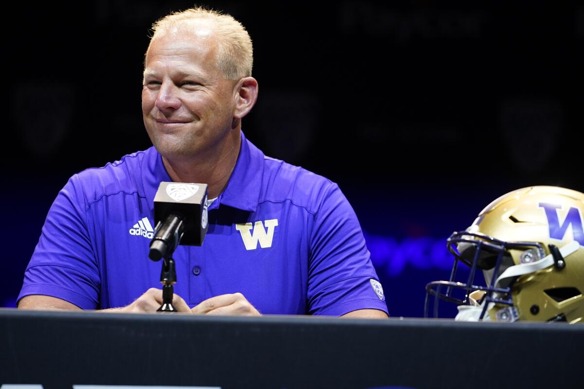 FILE - Washington head coach Kalen DeBoer speaks during Pac-12 Conference men's NCAA college football media day Friday, July 29, 2022, in Los Angeles. Washington is set to kick off its season on Sept. 3, 2022, against Kent State. (AP Photo/Damian Dovarganes, File)