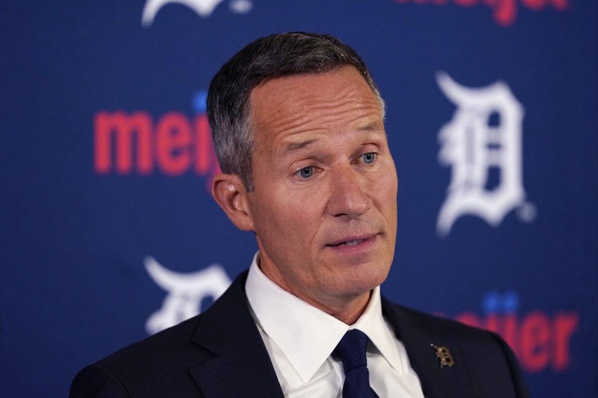 FILE - Detroit Tigers baseball team owner Chris Ilitch addresses the media during a baseball news conference on Aug. 10, 2022, in Detroit. Concerned over a possible bankruptcy of the company that owns local broadcasting rights for 14 of the 30 teams, Major League Baseball has formed a new economic study committee that will gather next week at the owners’ meetings in Palm Beach, Fla. Los Angeles Dodgers chairman Mark Walter and Detroit Tigers chairman Chris Ilitch are among the committee members, the person said. (AP Photo/Carlos Osorio, File)