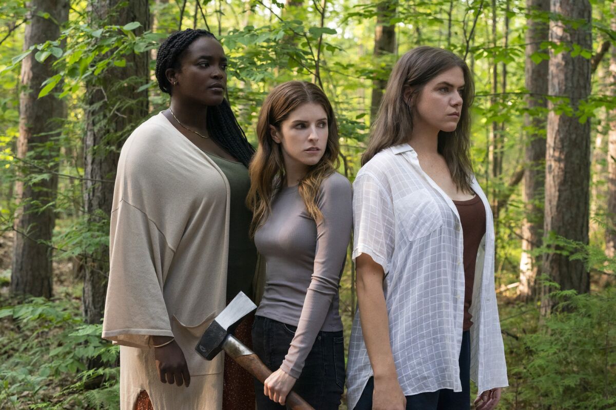 Three women in the woods