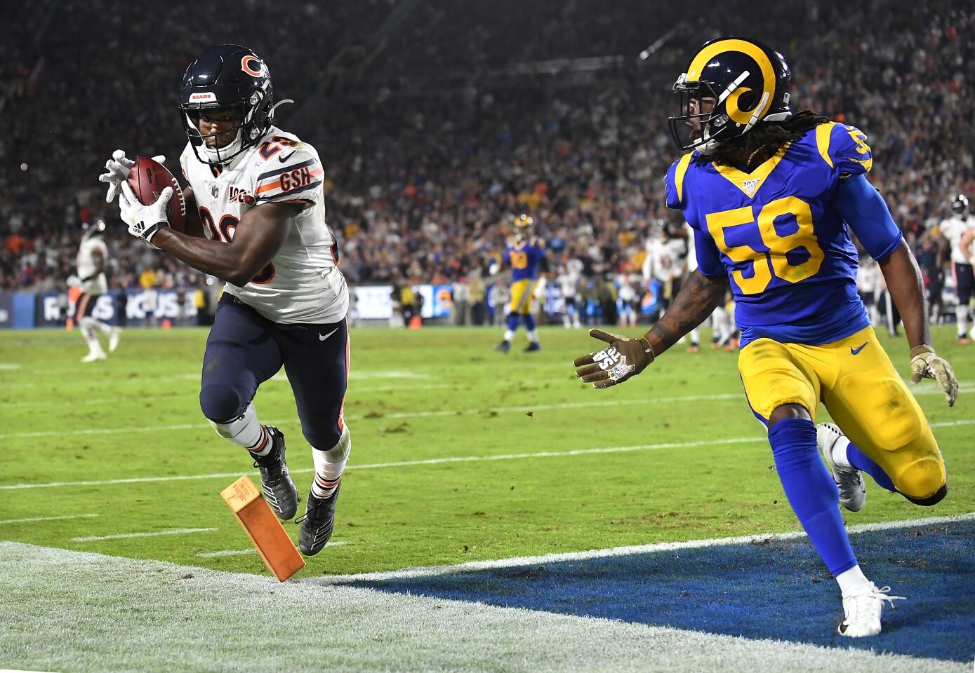 Bears wide receiver Kyle Fuller scores a touchdown in front of Rams linebacker Cory Littleton.