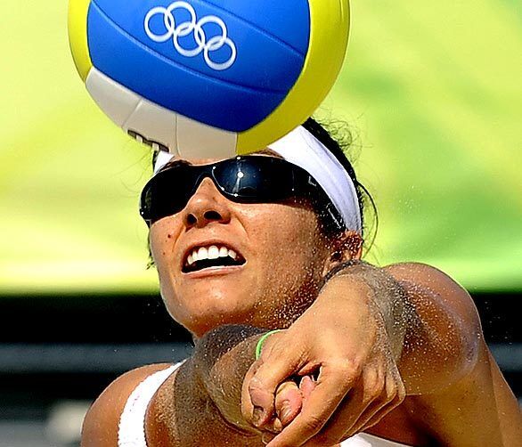 USA's Misty May-Treanor returns a serve during a semifinal match against Brazil at the 2008 Beijing Olympics.