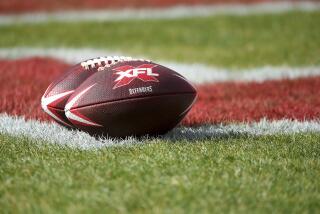 A detailed view of XFL DC Defenders footballs prior to the start of an XFL football game between the DC Defenders and the Seattle Dragons, Saturday, Feb. 8, 2020, in Washington. (AP Photo/Will Newton)
