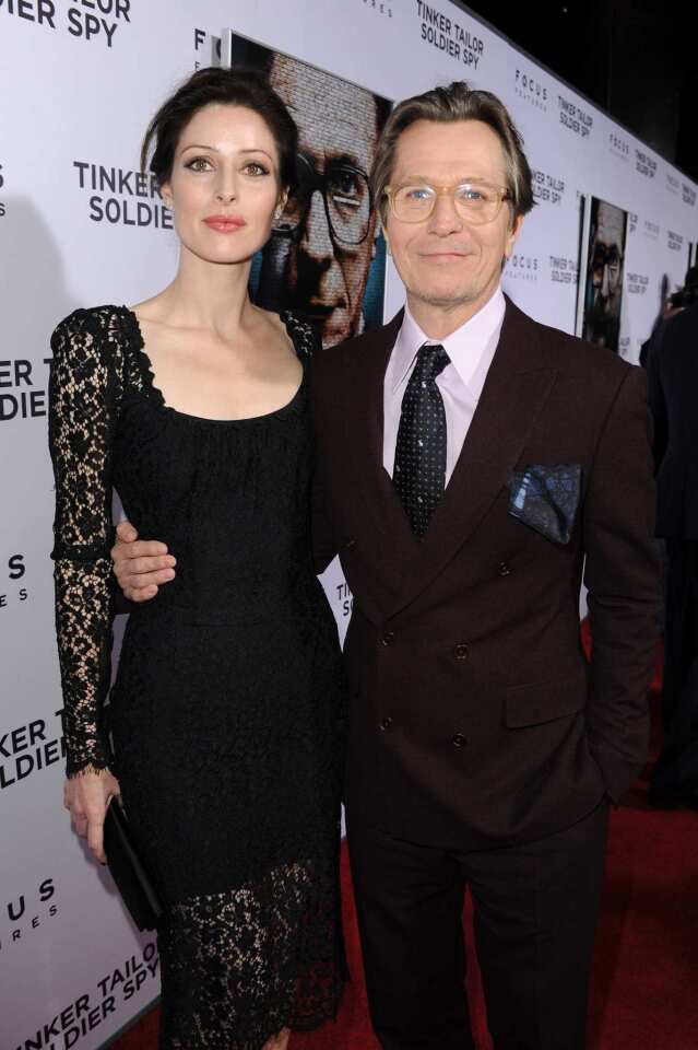 Gary Oldman and Alexandra Edenborough arrive at the premiere of "Tinker Tailor Soldier Spy" at ArcLight Cinema's Cinerama Dome on Tuesday night. Oldman plays the spy George Smiley in the adaptation of John Le Carre's famed novel.