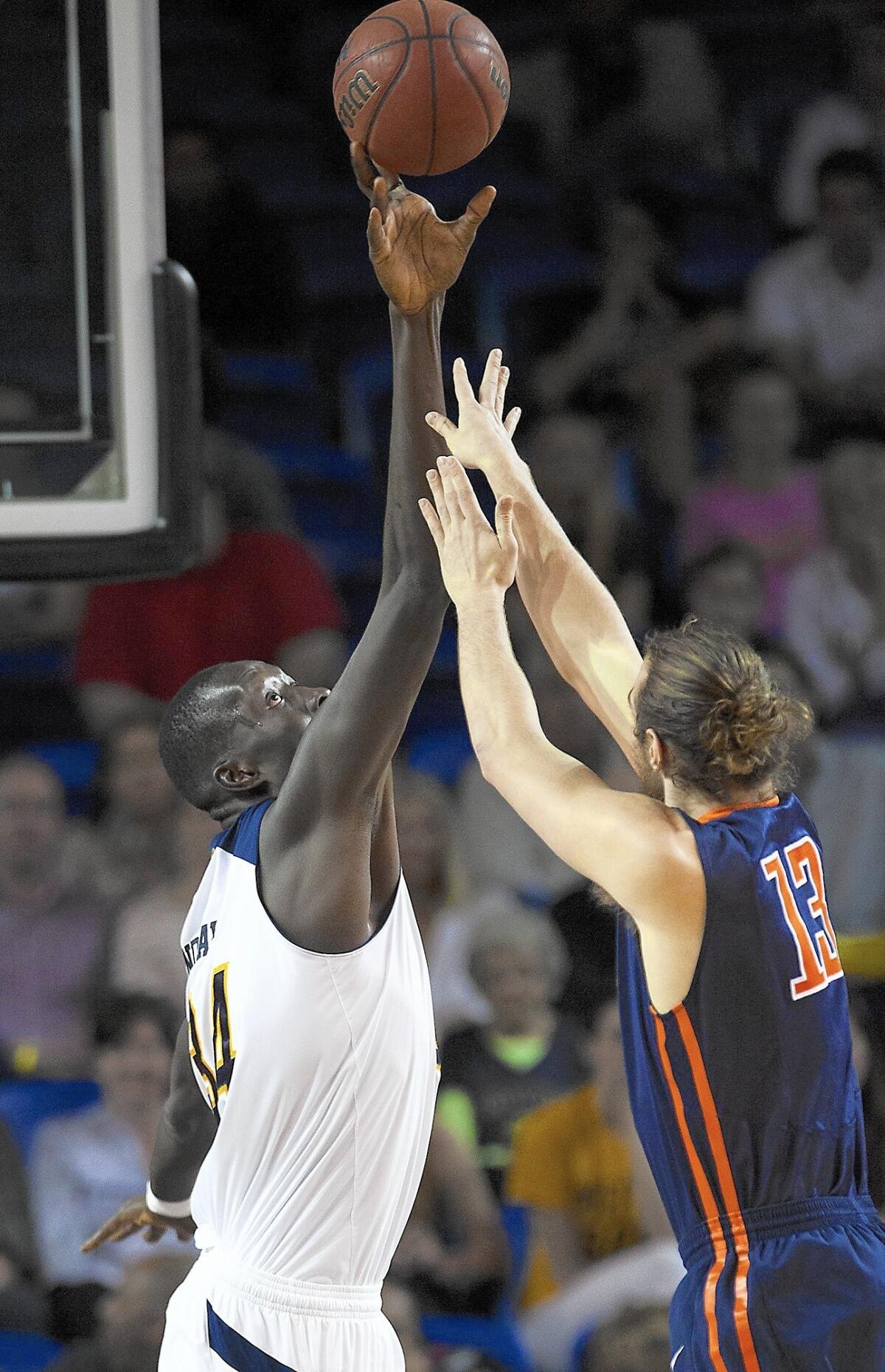 UC Irvine's Mamadou Ndiaye, seen here blocking a shot against Cal State Fullerton last year, has helped the Anteaters hold Big West Conference teams to 57.2 points per game on their way to a 4-0 start in conference.