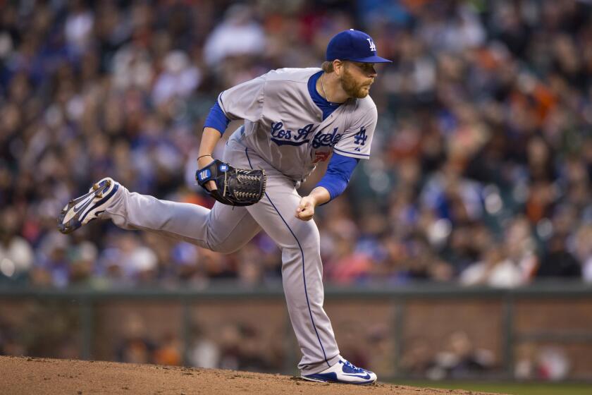 The Dodgers' Brett Anderson pitches against the San Francisco Giants during the first inning at AT&T Park on April 21.