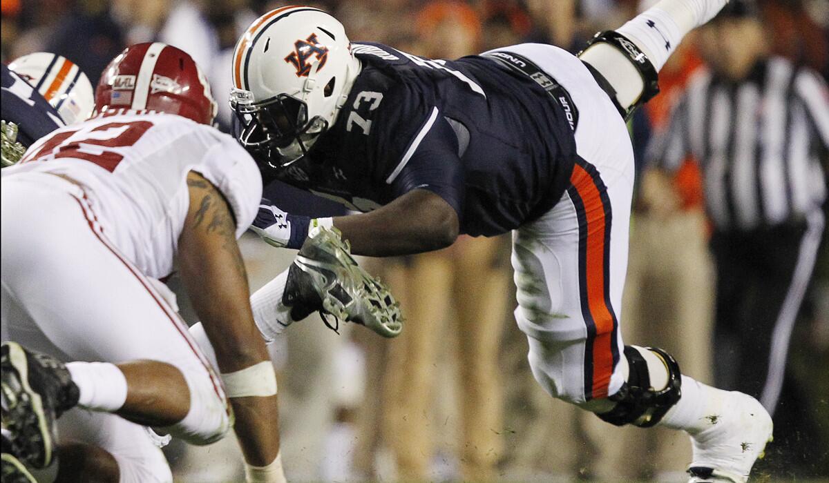 A few teams in the AFC and NFC East divisions could use a tackle like Auburn's Greg Robinson (73).