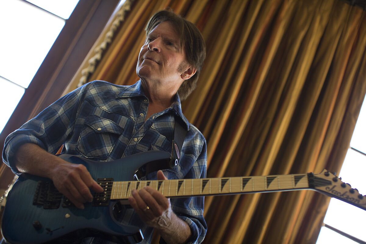 In his new album "Wrote a Song for Everyone," John Fogerty, photographed May 3 in Beverly Hills, revisits his classic Creedence Clearwater Revival songbook in duets with partners such as Foo Fighters and Jennifer Hudson and throws in two new songs which he says rank with the longtime favorites.