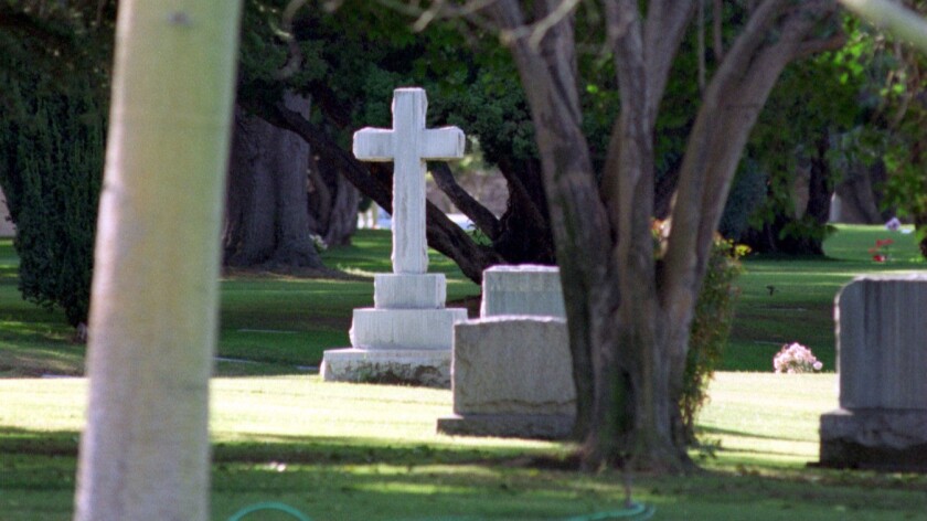 A shooting Sunday injured two men at Santa Ana's Fairhaven Memorial Park, seen here in 1996.