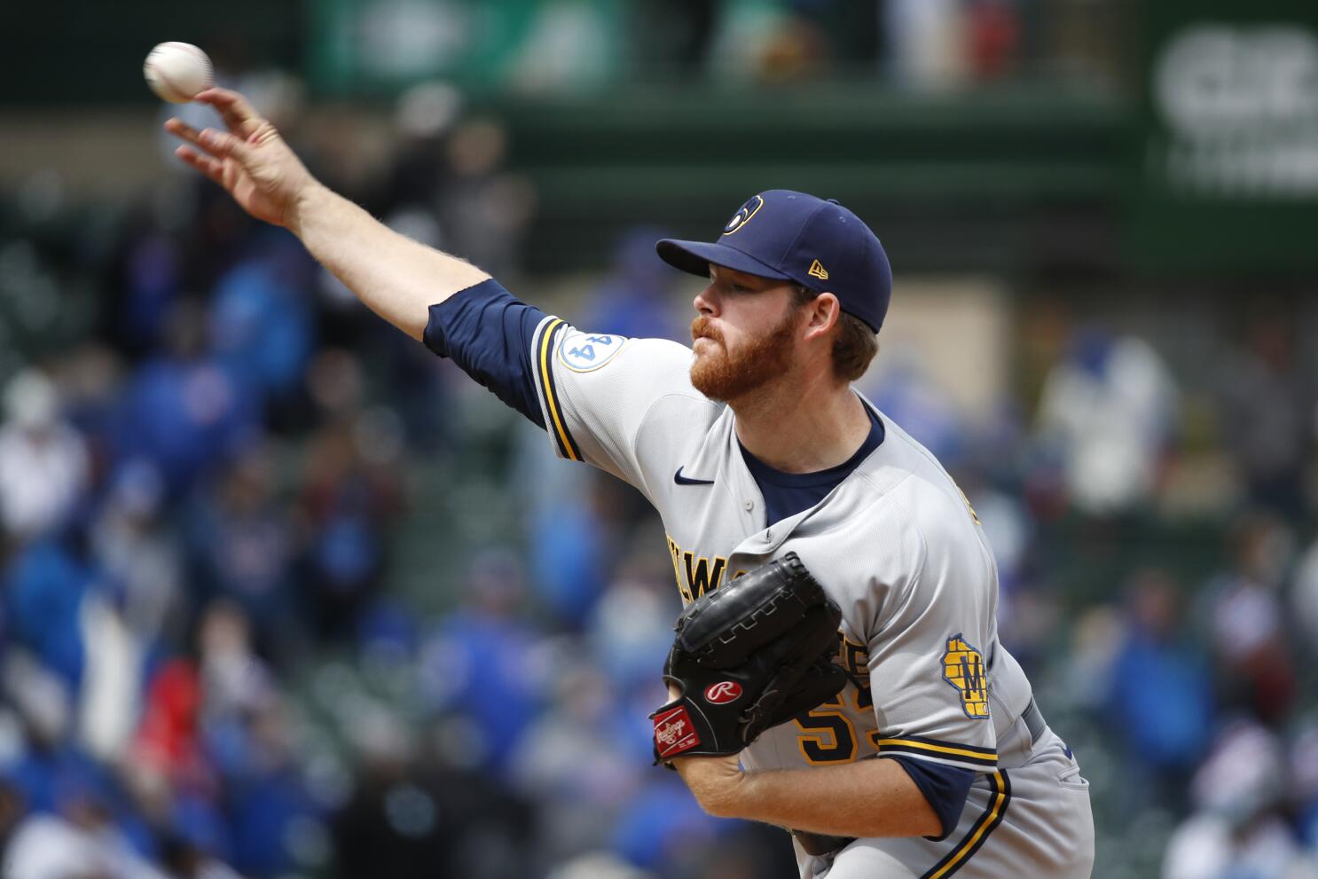 Brewers blow 4 leads, bow to Cubs in 11 innings