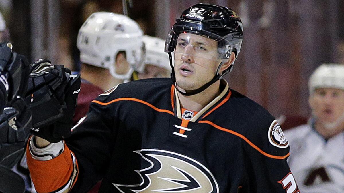 Shawn Horcoff celebrates a goal with Ducks teammates during a preseason game against the Avalanche.