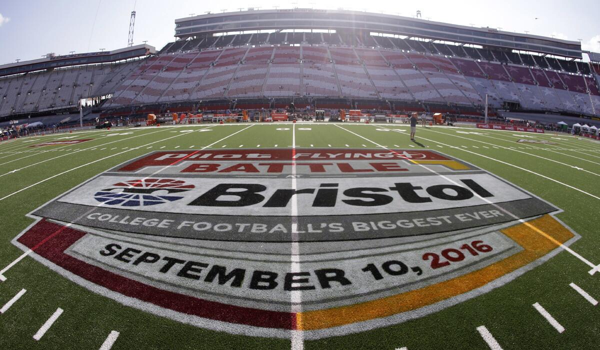 The logo for the "Battle of Bristol" college football game between Tennessee and Virginia Tech is displayed on the field at Bristol Motor Speedway Saturday.