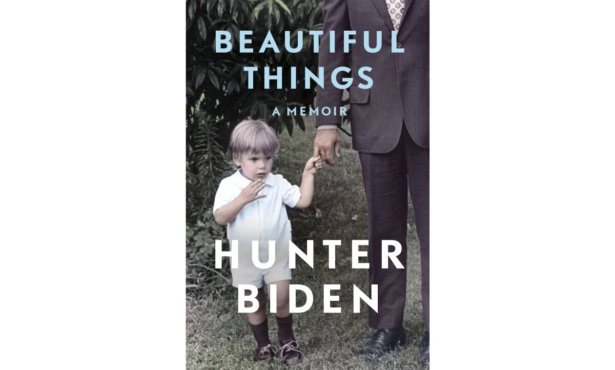 Hunter Biden as a toddler, holding his father's hand, on the cover of "Beautiful Things."