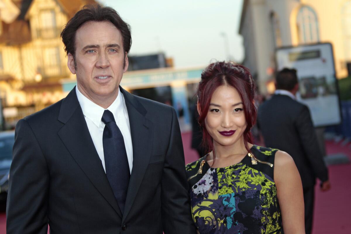Nicolas Cage and Alice Kim in 2013 at the Deauville American Film Festival in France.
