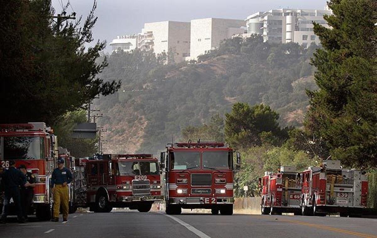 Fire trucks at a staging area on Sepulveda Boulevard near the Getty Center entrance.