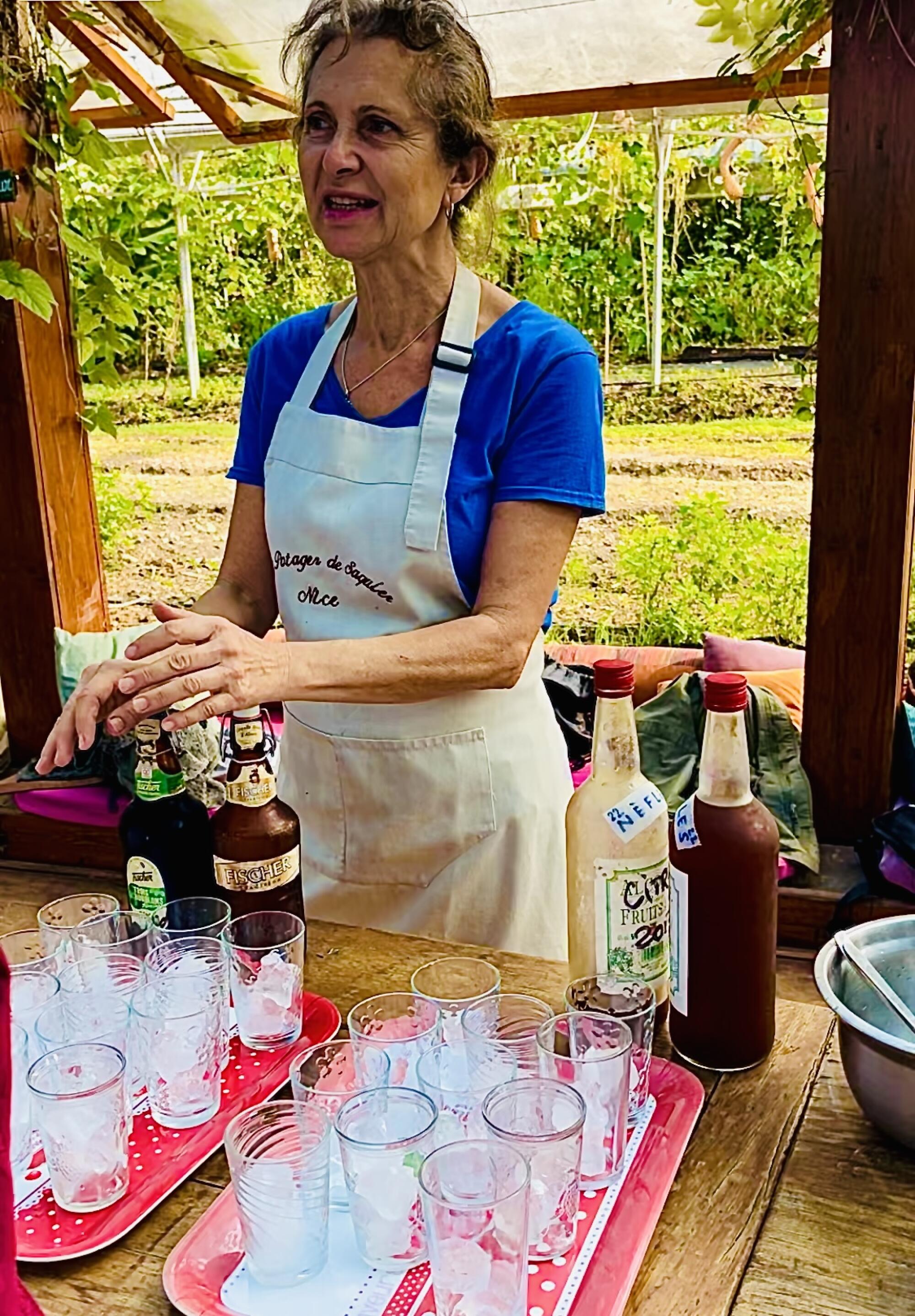 Le Potager de Saquier's Anne Magnani with liqueurs made from the farm's herbs and fruits.