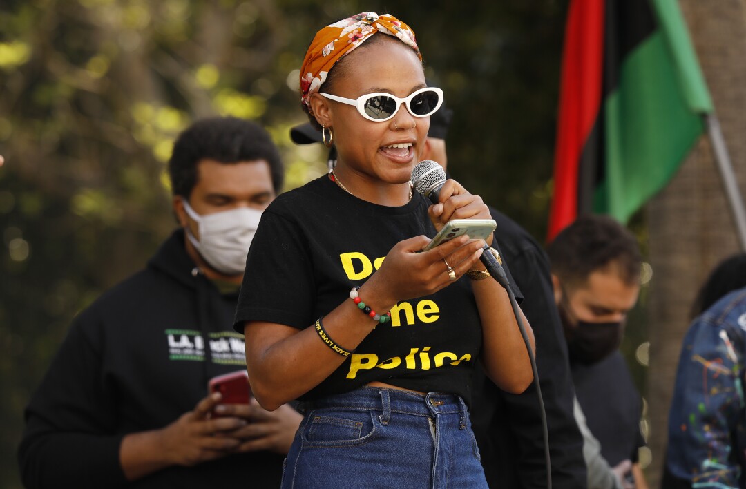 Hundreds gather in L.A. on anniversary of George Floyd's
death: 'Black lives matter everywhere' 3 Tyler Boudreaux speaks to a crowd of near 100 during a Black Lives Matter LA rally