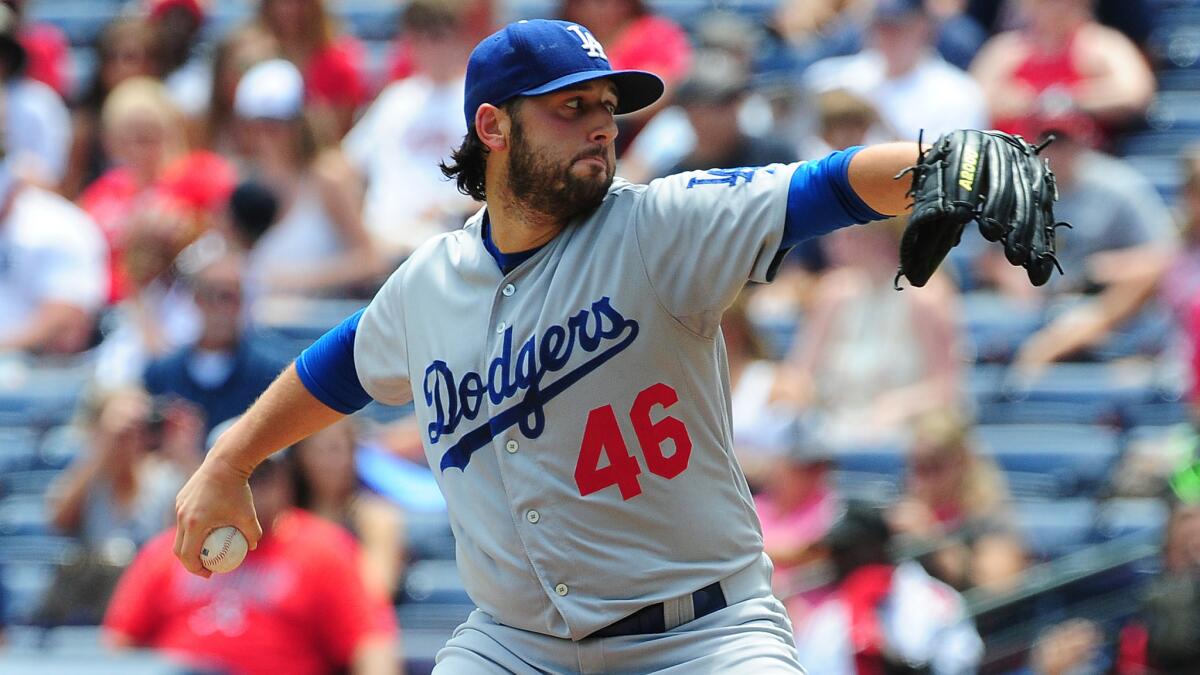 Dodgers starter Mike Bolsinger delivers a pitch during the second inning of a 3-1 victory over the Atlanta Braves on Wednesday.