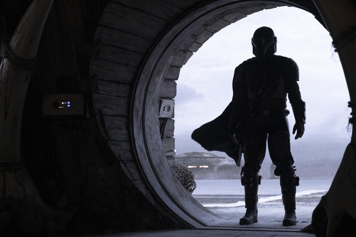 The helmeted Pedro Pascal, star of the Disney+ series "The Mandalorian."