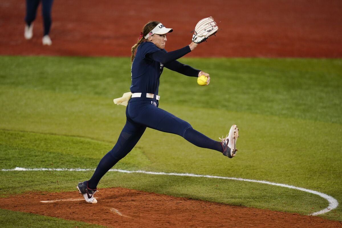Monica Abbott pitches during a softball game at the Tokyo Olympics.