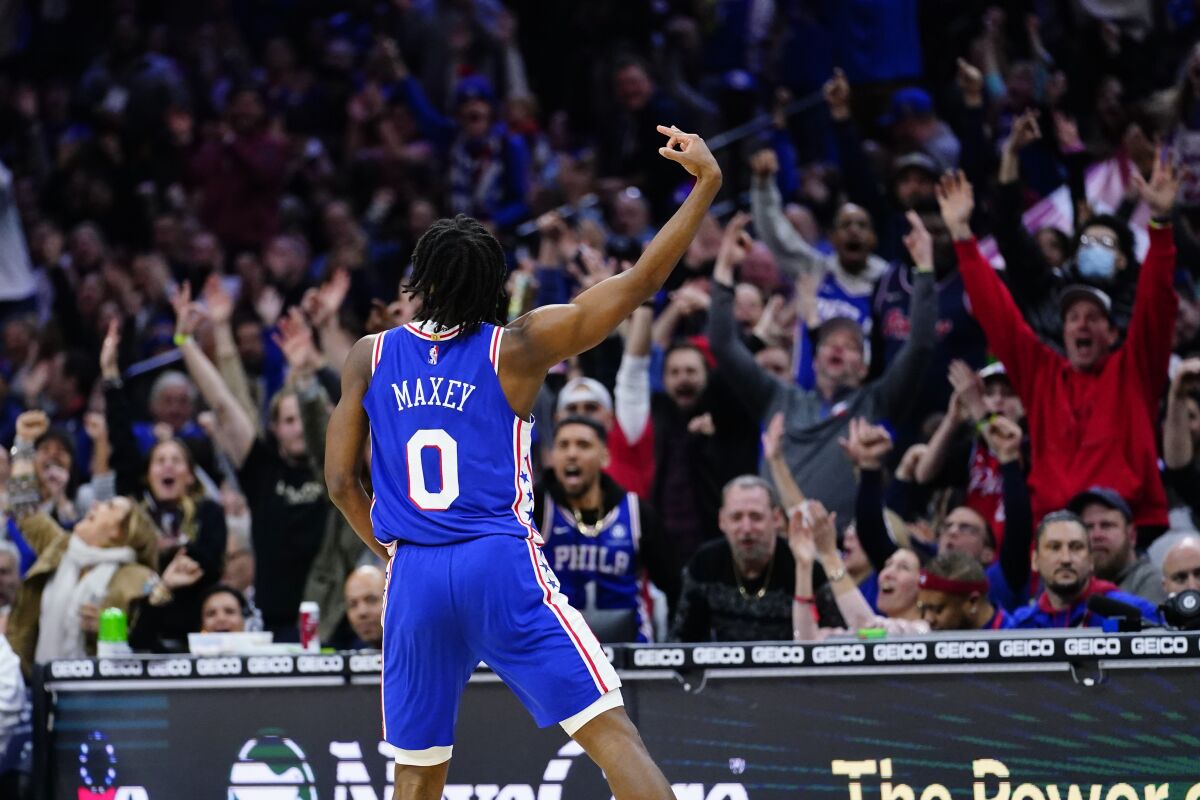 Philadelphia 76ers' Tyrese Maxey reacts during the second half of an NBA basketball game against the Cleveland Cavaliers, Friday, March 4, 2022, in Philadelphia. (AP Photo/Matt Slocum)