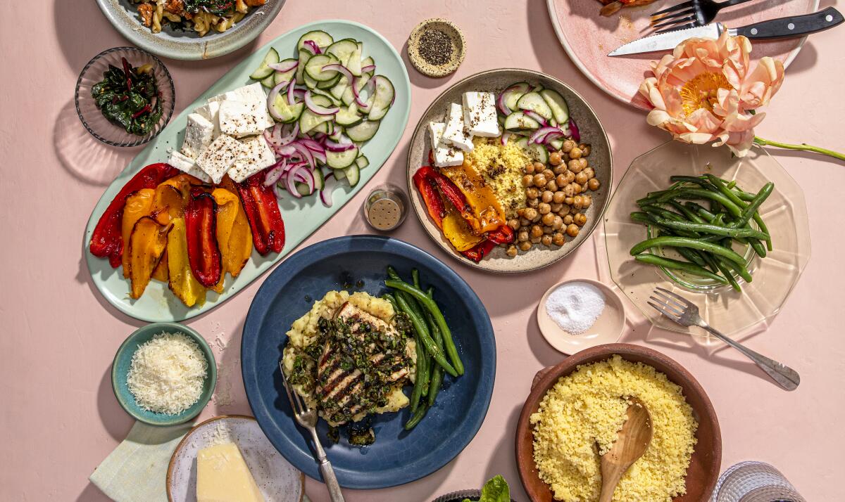 An array of prepared dishes and platters  