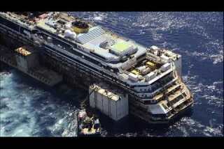 Costa Concordia towed to Genoa for scrap