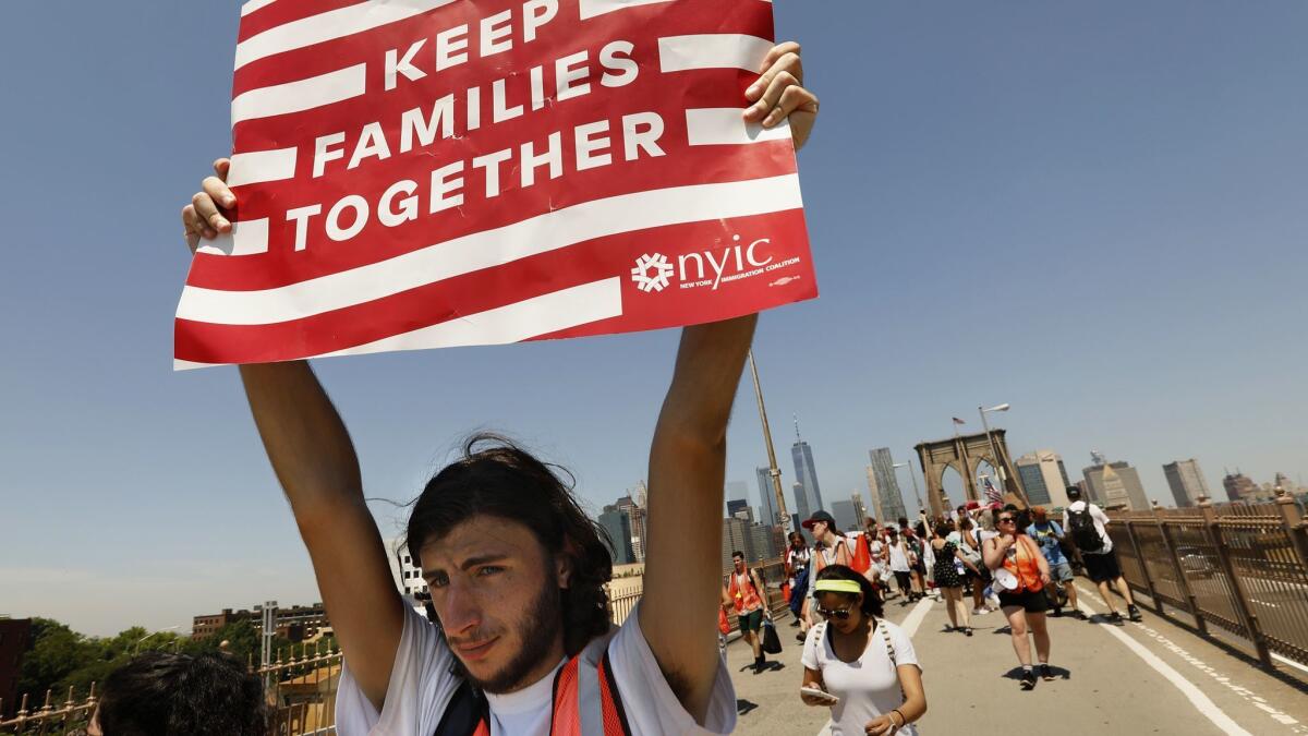 Ariel Schwartz, 19, of Long Island, N.Y., takes part in the march to "Keep Families Together" in June in New York.