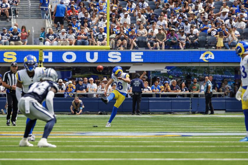 Rams rookie Joshua Karty (16) kicks off against the Dallas Cowboys in the preseason. 