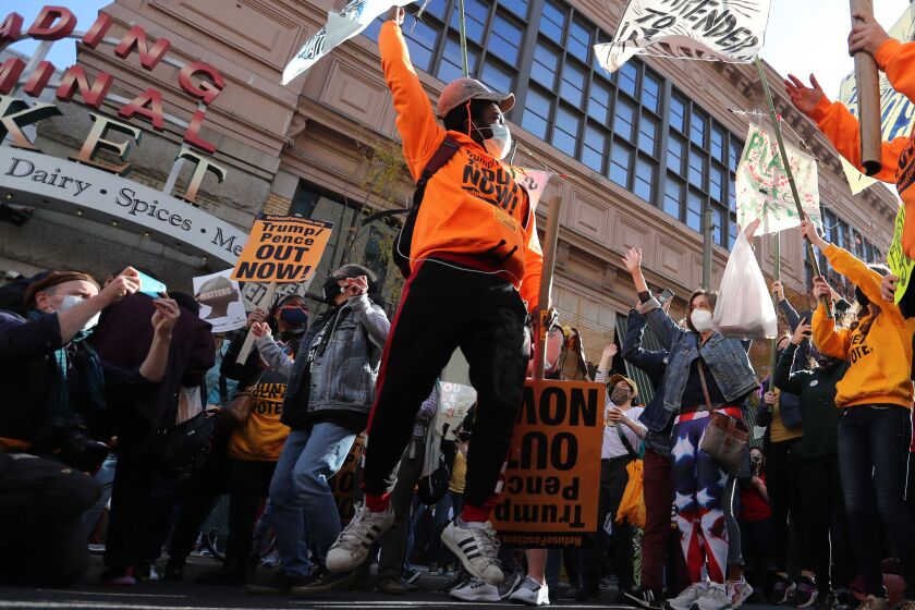 PHILADELPHIA, PA.- NOV. 6, 2020. Anti-Trump protesters rally outside the Philadelphia Convention Center as vote counting in Pennsylvania indicated a surge by Democratic candidate Joe Biden on Friday, Nov. 6, 2020. (Luis Sinco / Los Angeles Times)