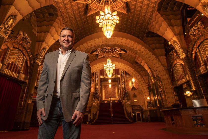 General manager Jeff Loeb stands inside the grand lobby of the Pantages Theatre in Hollywood