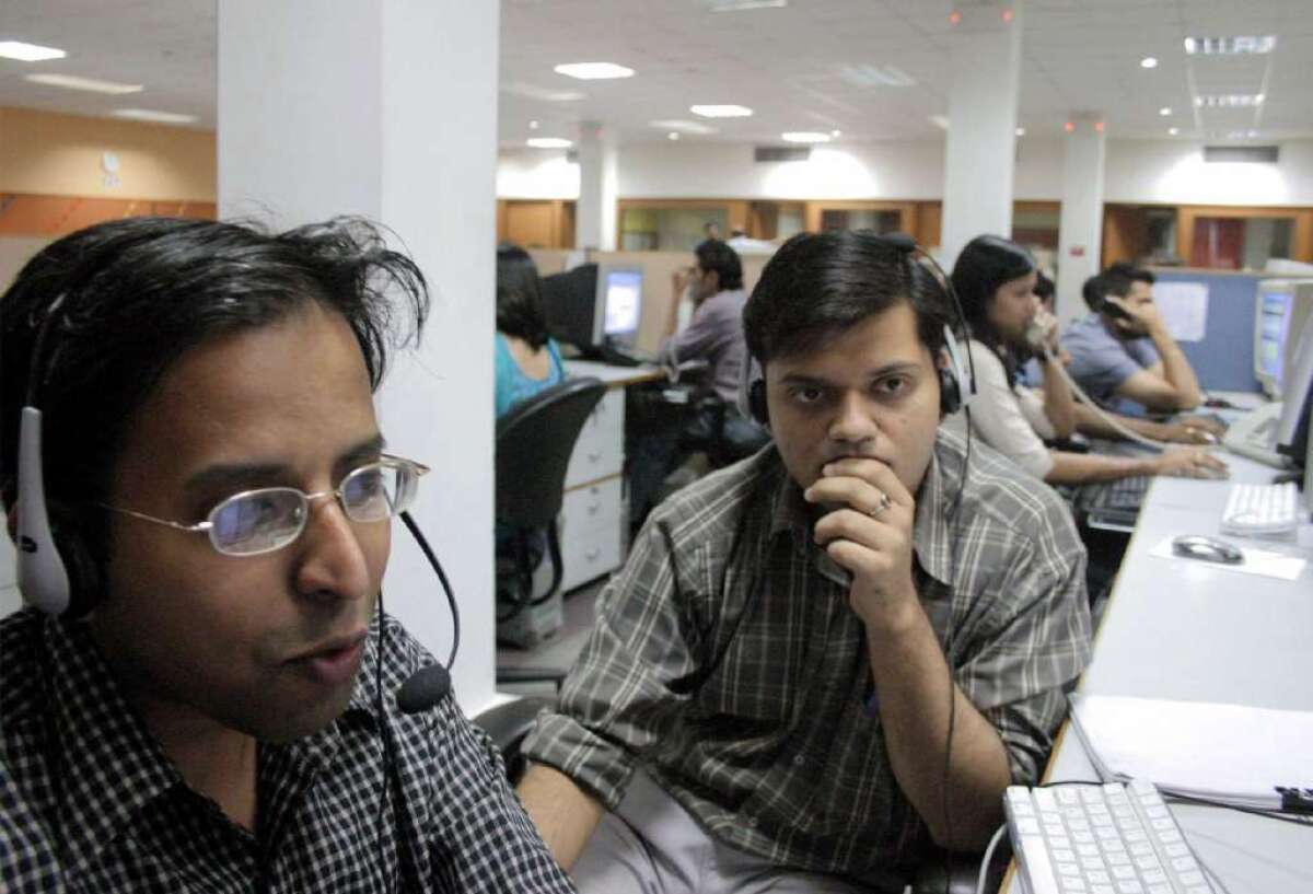 Many U.S. businesses use overseas call centers, such as this one in India, for customer service. Is it safe to give your personal information to workers abroad?