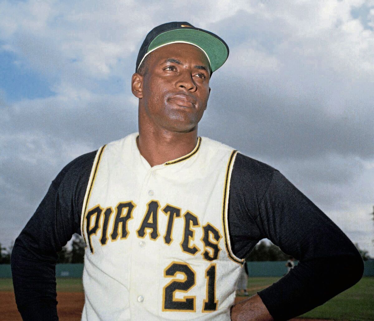 File-Pittsburgh Pirates outfielder Roberto Clemente. The Pittsburgh Pirates will honor Hall of Famer Roberto Clemente when they wear No. 21 against the Chicago White Sox on Wednesday, Sept. 9, 2020. The team believes this is an important step into having Clemente's number retired by Major League Baseball(Pittsburgh Tribune-Review via AP, File)/