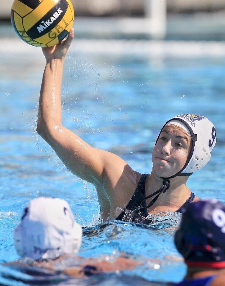 Newport Water Polo Foundation's Kate Pipkin scores the first goal of the game during the first quarter against the United Water Polo Club in a USA Water Polo Junior Olympics match at Capistrano Valley High in Mission Viejo on Thursday.