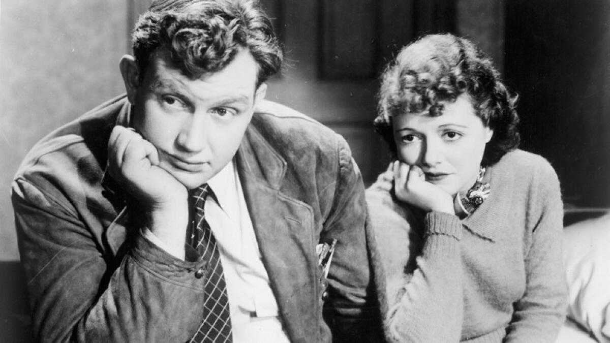 Andy Devine and Janet Gaynor in "A Star Is Born."
