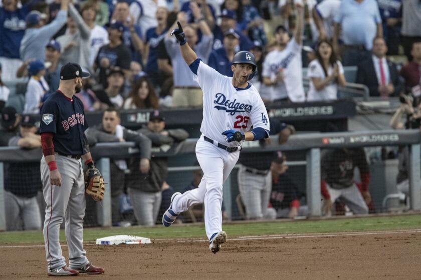 LOS ANGELES, CA - OCTOBER 28, 2018: Los Angeles Dodgers first baseman David Freese (25) reacts after hitting a solo homer in the first inning of Game 5 of the World Series at Dodger Stadium on October 28, 2018 in Los Angeles, California.(Gina Ferazzi/Los AngelesTimes)