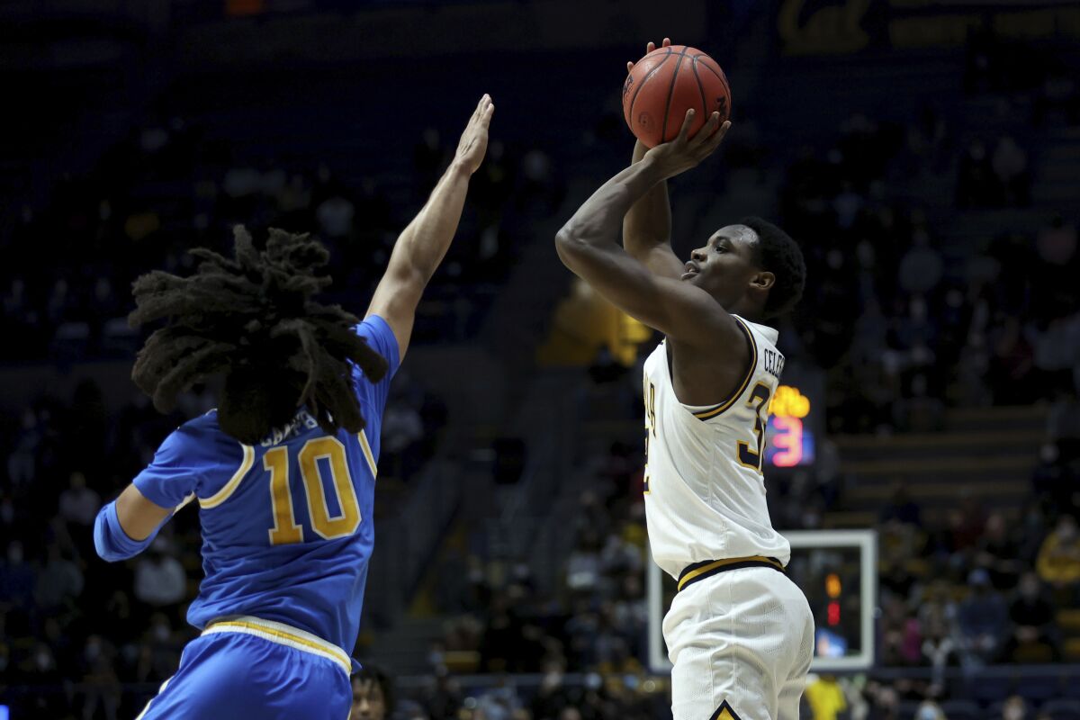 California guard Jalen Celestine (32) shoots against UCLA guard Tyger Campbell (10) during the first half of an NCAA college basketball game in Berkeley, Calif., Saturday, Jan. 8, 2022. (AP Photo/Jed Jacobsohn)