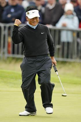 K.J. Choi of South Korea ends his day with a birdie on 18 -- and the lead -- after the second round of the British Open at the Royal Birkdale golf course in Southport, England.