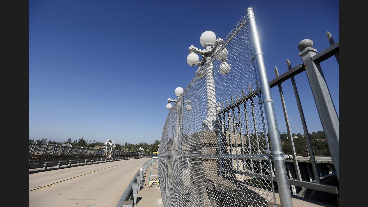 Photo Gallery: Colorado Street Bridge in Pasadena gets protective mesh fencing around 20 alcoves to prevent easy access to jump