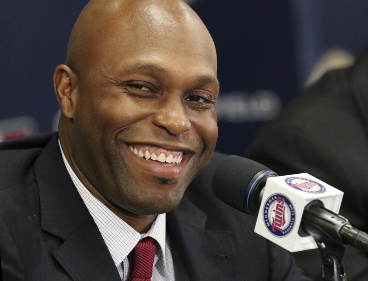 Torii Hunter smiles at a news conference announcing his retirement in Minneapolis on Nov. 5.