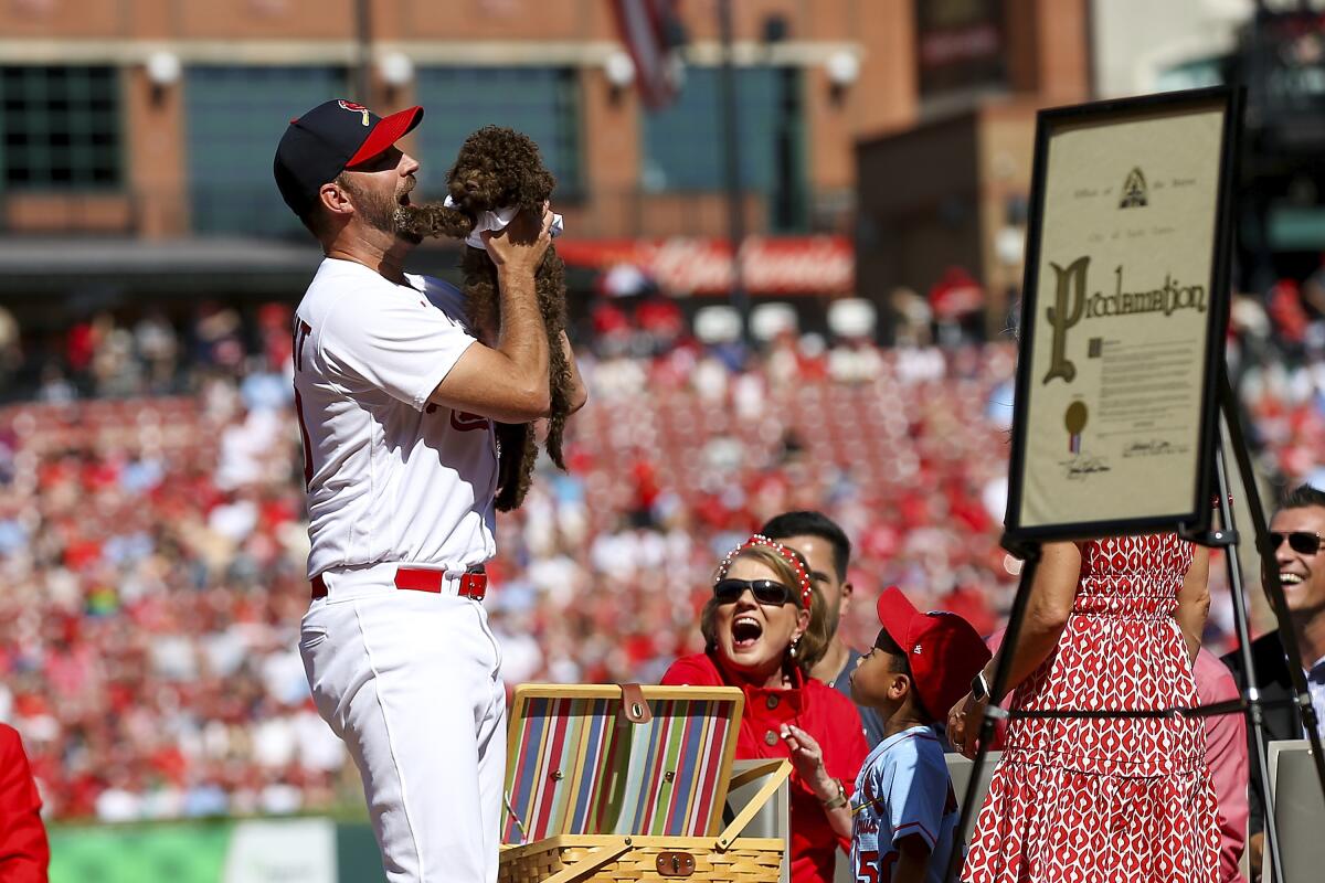 Adam Wainwright promised his kids a puppy when he retired. Cardinals  delivered on final day, National