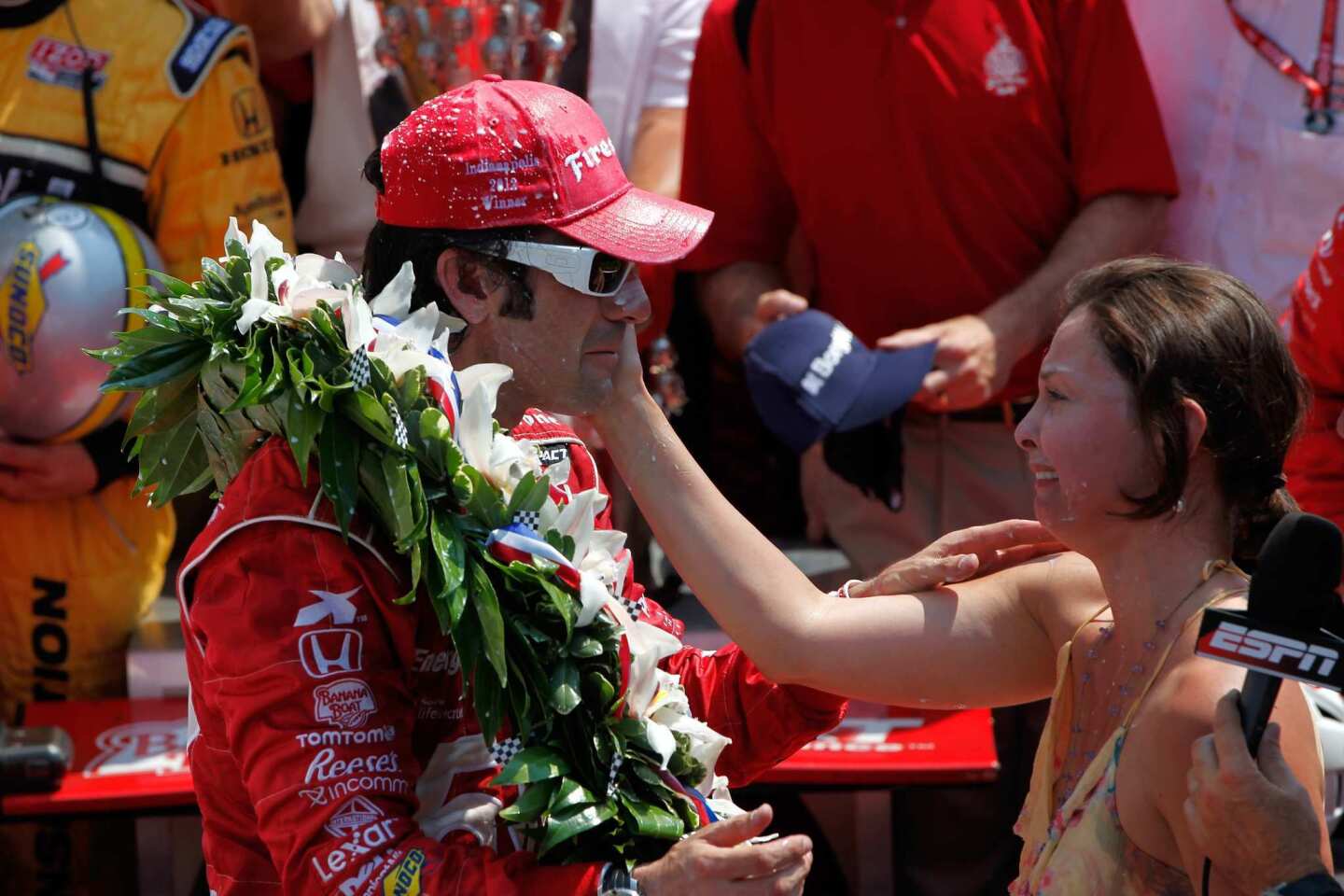 Dario Franchitti shares an emotional moment with wife Ashley Judd after winning the Indianapolis 500 on Sunday.