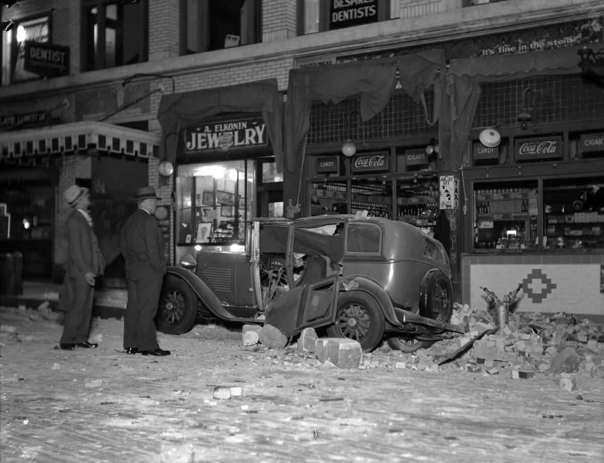 March 10, 1933: Building and automobile on Beacon Street in San Pedro damaged by the Long Beach earthquake.