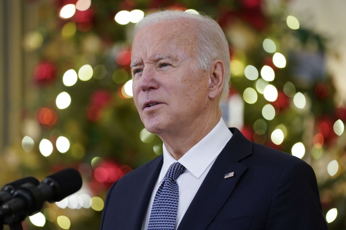 President Joe Biden delivers remarks on the November jobs report, in the State Dining Room of the White House, Friday, Dec. 3, 2021, in Washington. (AP Photo/Evan Vucci)